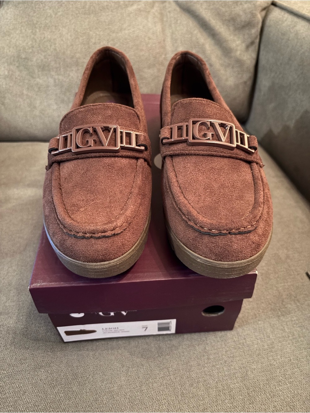 Gloria Vanderbilt “Leigh” Brown Slip On Loafers with GV logo hardware.  NIB